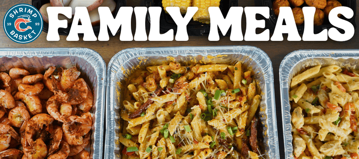 Banner with bold 'FAMILY MEALS' text above three foil trays of shrimp and pasta dishes.